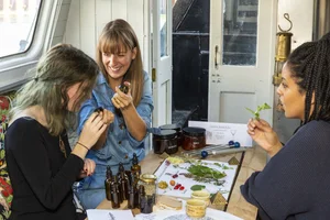 Participants smelling botanical essences during an immersion