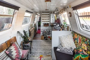 The saloon with kilim cushions and layered textiles